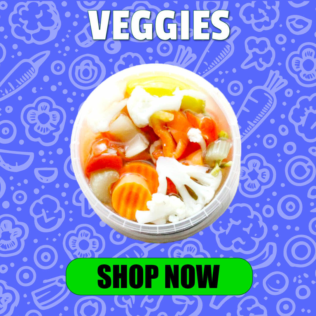 Marinated and pickled vegetables including sun-dried tomatoes, marinated artichokes, giardiniera, and pickled mushrooms